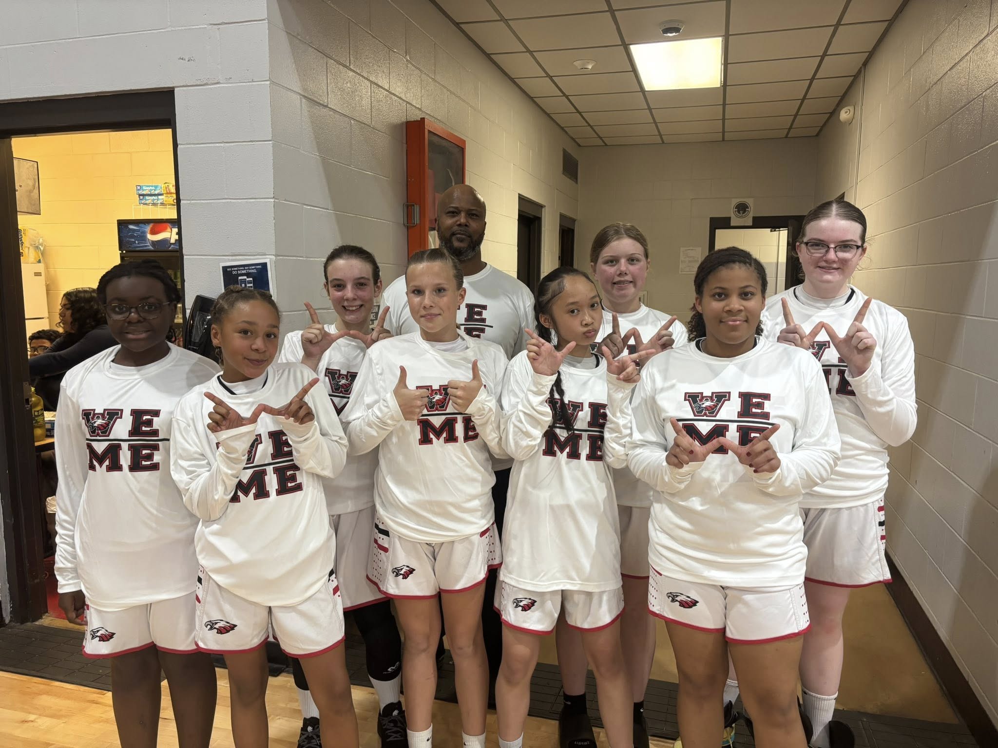 Run & Shoot team in white jerseys